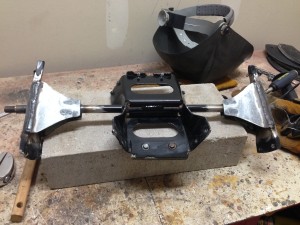 Showing redesigned auger with new gussets after welding before paint